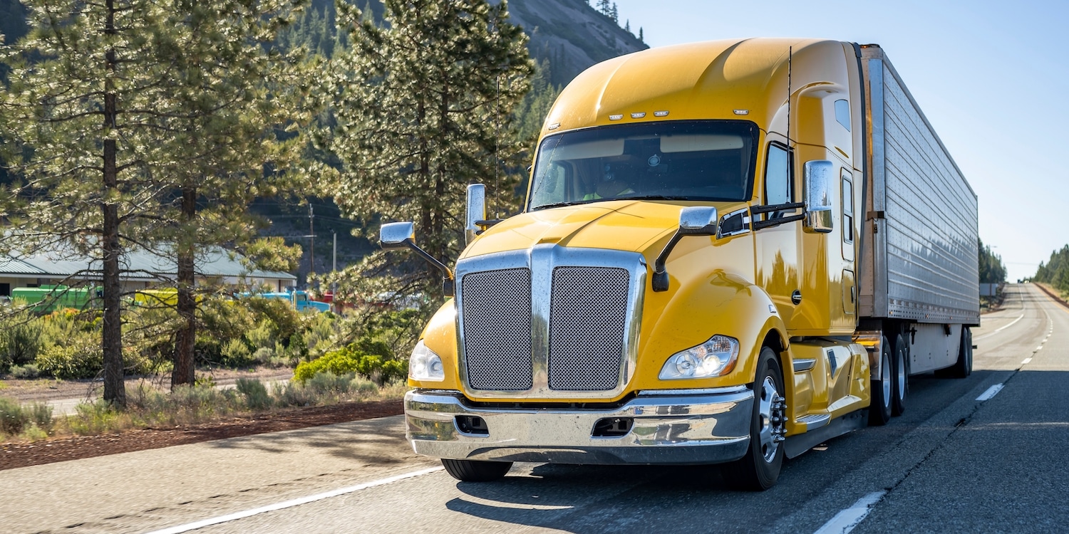 A yellow semi-truck that could be used for interstate or intrastate trucking